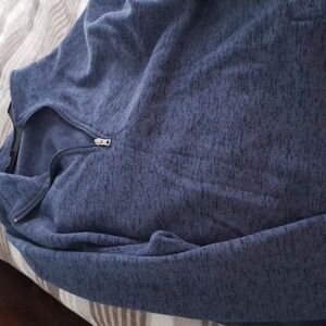King Size One Blue Zippered sweater with front pockets. Never worn